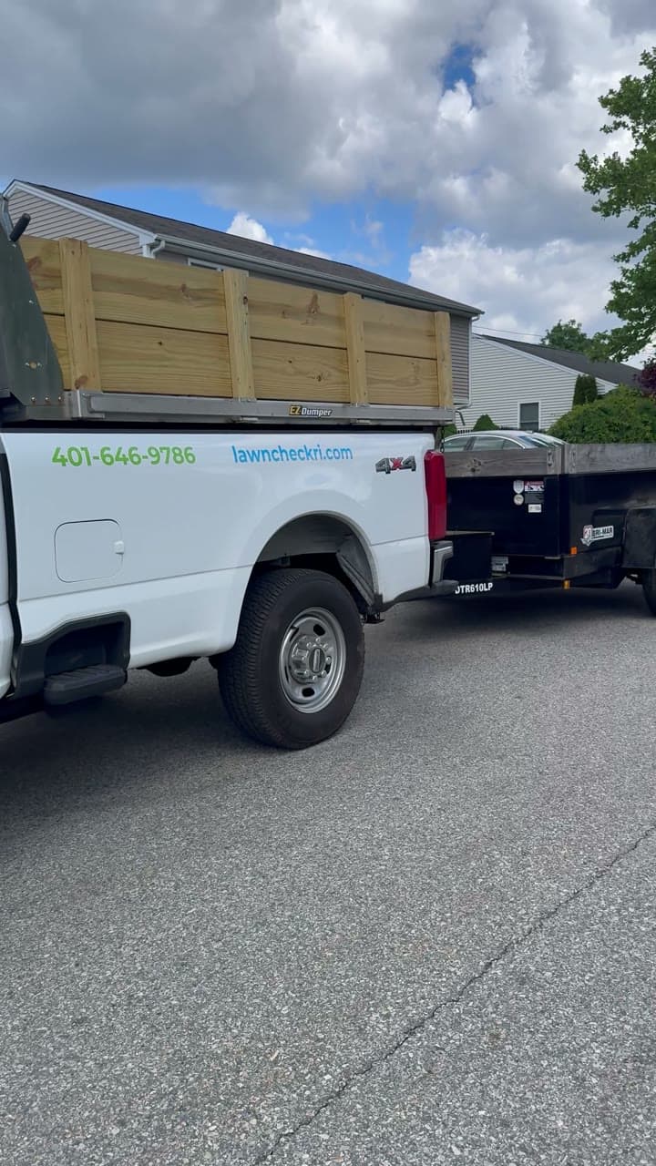 A LawnCheck dump truck loaded up for a grounds-maintenance job in the East Bay