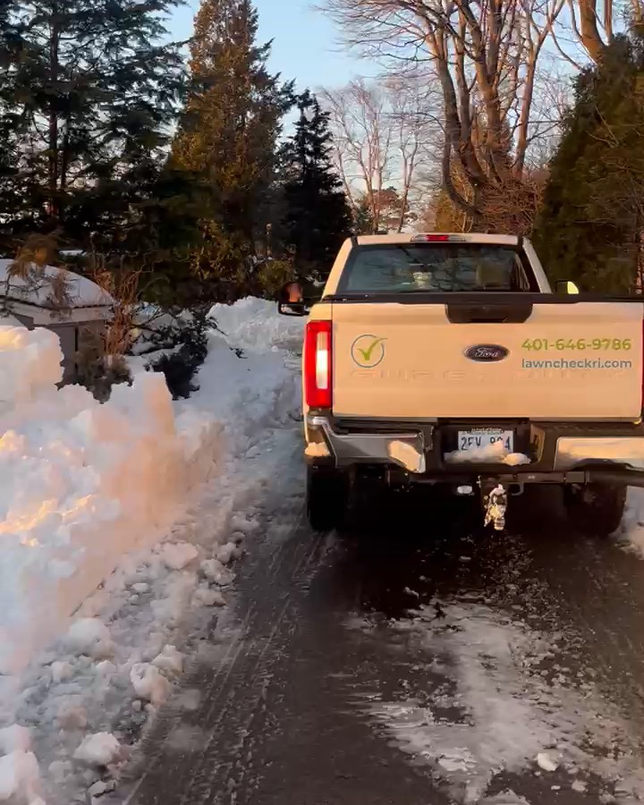 A driveway plowed to the pavement